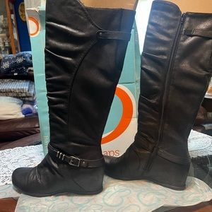 Beartrap,Quinsies black knee wedged boot with a sliver tone buckle around ankle,